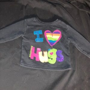 Black sweatshirt that says I love hugs